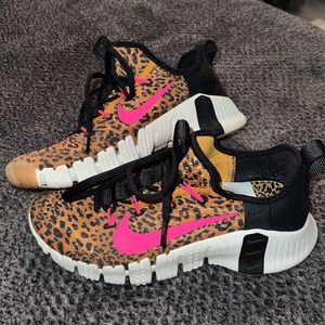 Nike women’s free metcon 3. Cheetah print and neon pink. Women’s size 8.5